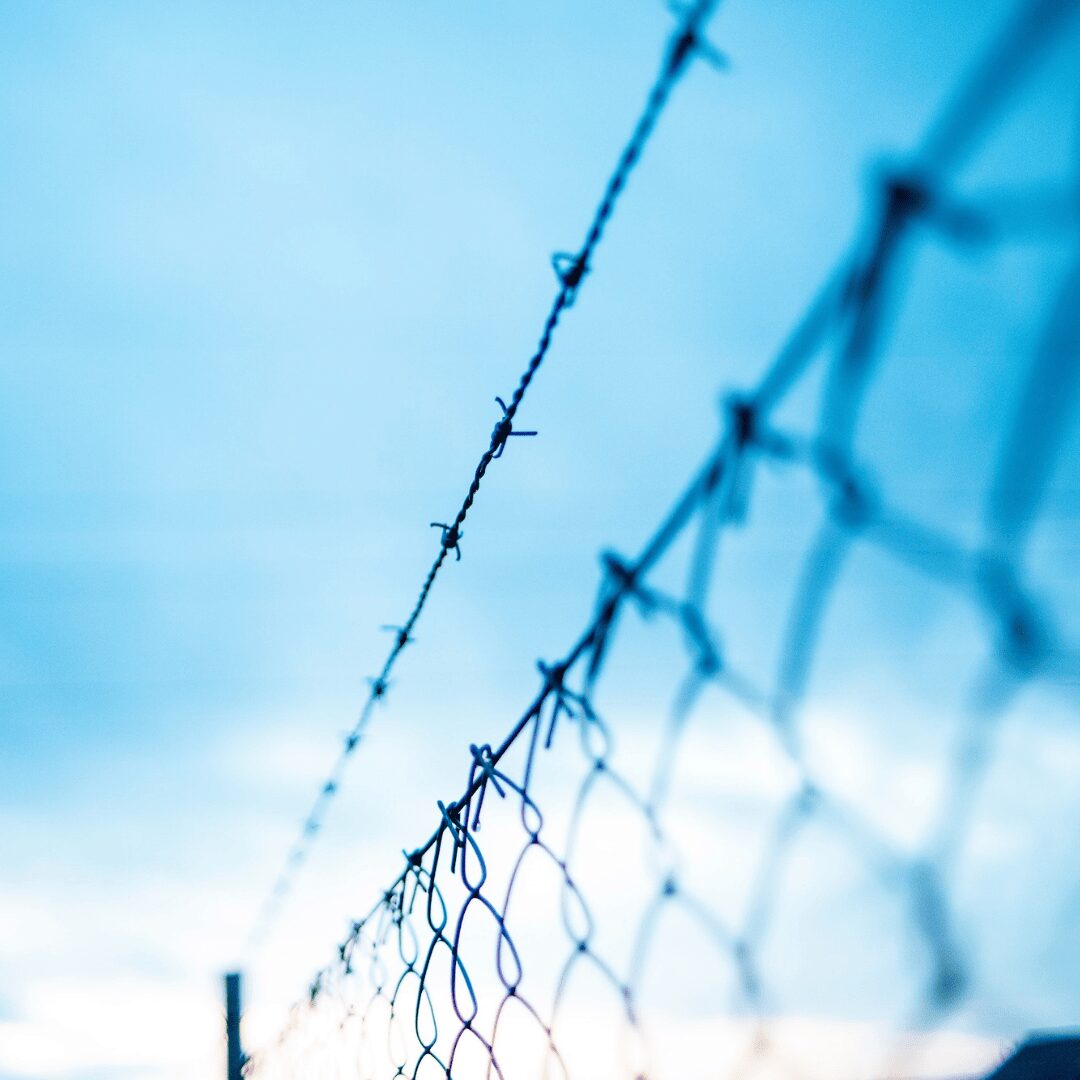 Blue sky with fence